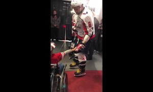 Ovechkin gives his stick to young fan in wheelchair
