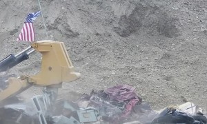 Bulldozer Flattens Cars