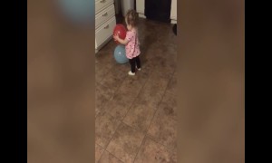 Baby Girl Learns about Balloons