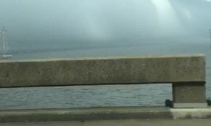 Driving Towards a Huge Rolling Storm