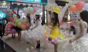 Models demonstrate unique balloon dresses at Chinese mall