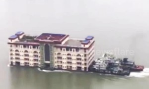 'Floating apartment building' boat moved downriver in China