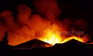 Large blaze tears through warehouse in Greater Manchester