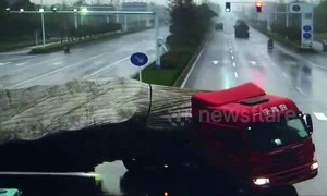Oblivious scooter rider escapes being crushed by out-of-control lorry