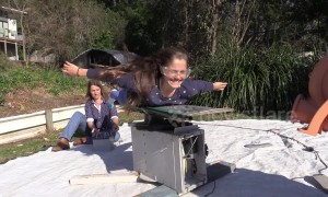 Australian science teacher gives daughter her first iFly experience using wakeboard and bouncy castle fan