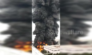Pillar of black smoke spews from huge fire at Chinese industrial park