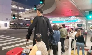 World's tallest man arrives at LAX