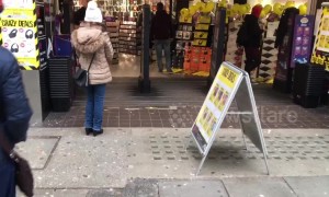 London's Oxford Street looks deserted as just a few senior citizens queue outside HMV