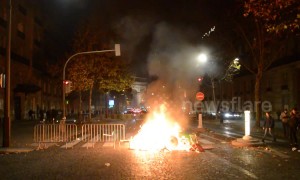 Vehicles burn in Paris as "yellow vest" protest continues overnight