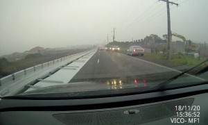 Roadwork Barriers Blow Down onto Road