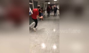 'When your mate is getting with his ex' Shocking moment man slide tackles couple