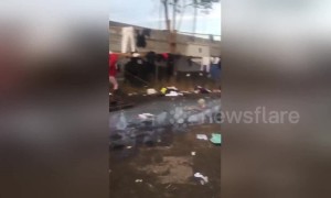 Footage shows conditions of shower area at migrant shelter by US-Mexico border