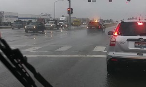 Car Speeds past on Rims During High-Speed Pursuit