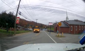 School Bus Honks Horn at Car to Protect Children
