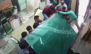 Workers trapped under glass sheets, rescued in nick of time