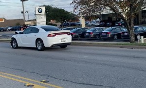 Man Jumps on Hood to Avoid Hit and Run