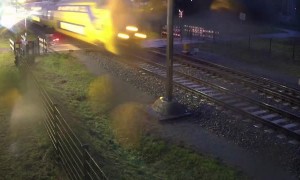 Cyclist misses oncoming train my mere inches