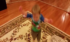 Determined Little Boy Learns how to Hop on One Foot