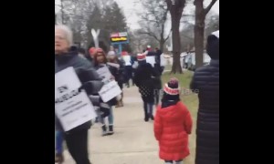 Kindergarten student joins teachers in 1st US charter school strike