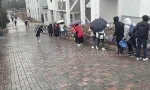 Chinese university students slip on icy ramp road following rainfalls