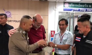 American tourist, 74, re-united with $10,000 he forgot in airport taxi