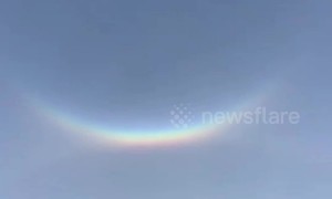 Amazing upside-down rainbow and sun dog spotted in north China