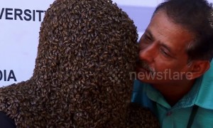 Indian man wins world record for wearing 60,000 bees on his face for four hours