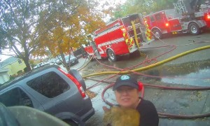 Fireman Rescues Cat from House Fire