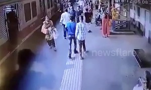 Two brave cops save women from slipping under moving train in Mumbai