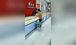 Woman is chased by jewellery shop clerk after being mistaken for robber