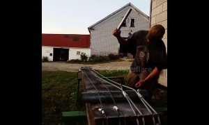 Maine farmer makes enormous bass out of wooden beam