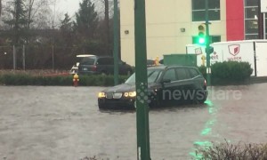 Cars stranded on flooded streets after heavy downpour inundates Metro Vancouver