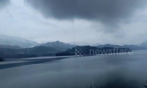 Incredible waterspout spotted over reservoir in southern China
