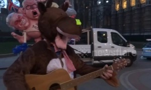 Christmas-themed protesters on the streets of London ahead of no-confidence vote