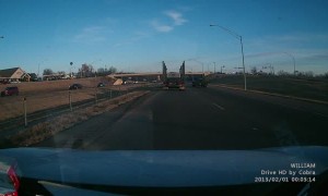 Truck Crosses Highway into Oncoming Cars