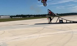 Jumping a Bi-Plane on a Motorcycle