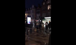 Police escort citizen from St. Mary's Street cordon in Cardiff during 'ongoing incident'