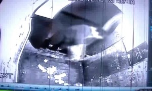 Security camera catches woman throwing rubbish into a lift