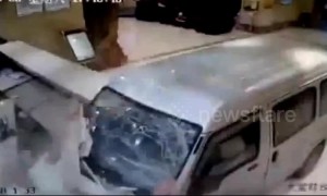 Receptionist narrowly escapes death when minibus careers into hotel lobby