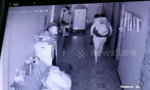 Wife gives husband a piggy back as he's so drunk he can't walk