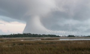 Microburst? Waterspout? Strange cloud formation baffles Oak Island, North Carolina residents