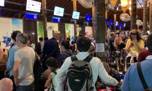 Chaos in Thai airport as stranded tourists rush to leave islands