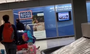 Dad Drags Daughter Through Airport