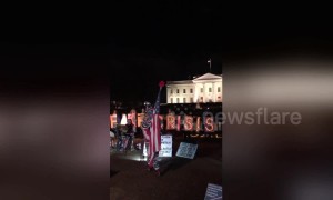 Protesters rally outside White House as Trump makes TV address about 'humanitarian crisis'