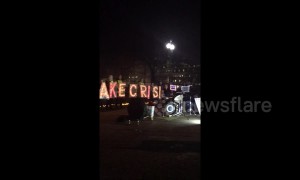 "No wall, no shutdown!" Protesters rally outside White House as Trump makes TV address