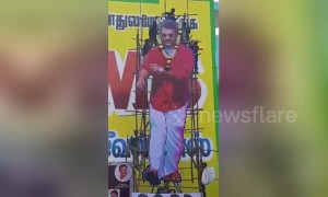 Actor cutout scaffolding collapses as fans climb on top in South India province