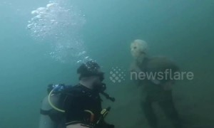 Fake skeleton, grandfather clock in strange underwater Arizona world