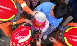 Naughty boy uses spittoon as hat and gets head stuck inside