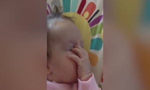 Baby Discovers her Hands!