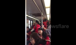 LA teachers break into rally chants on Metro enroute to second day of strikes